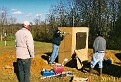 Mike Majors installs memorial plaques.