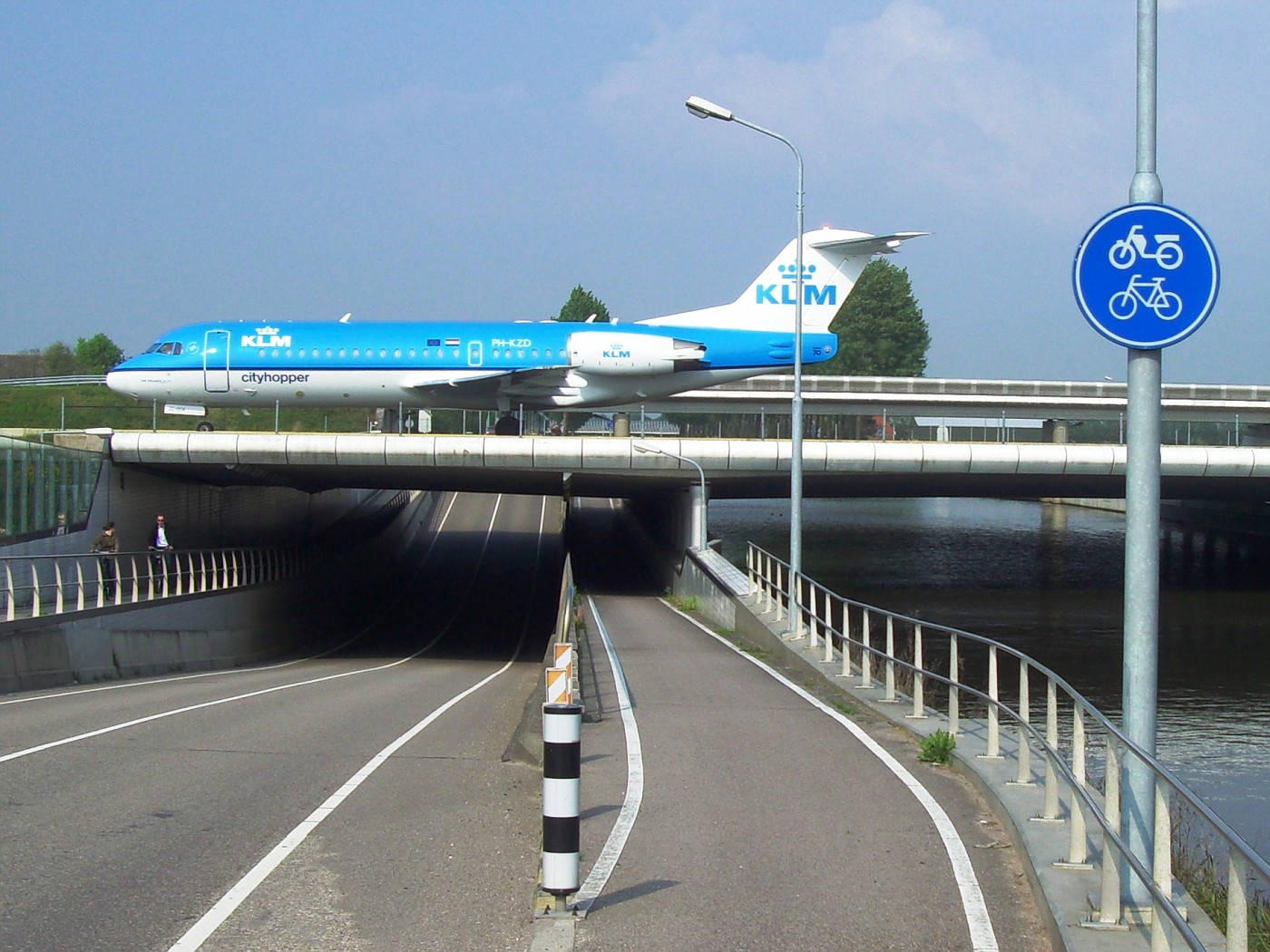 Airplane crosses cycle track