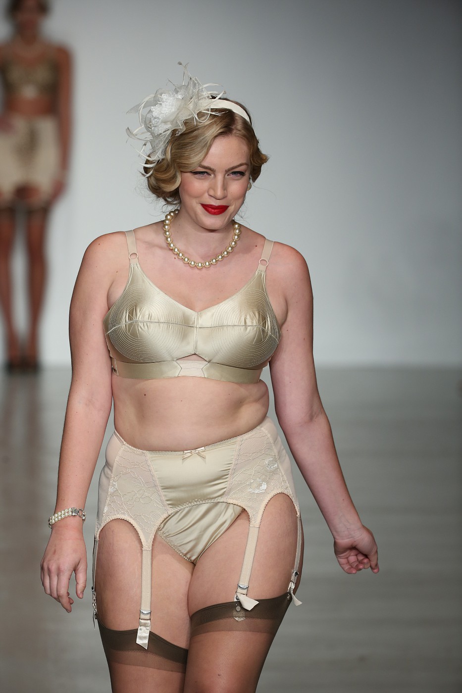 NEW YORK, NY - OCTOBER 24: A model walks runway wearing Secrets in Lace lin...